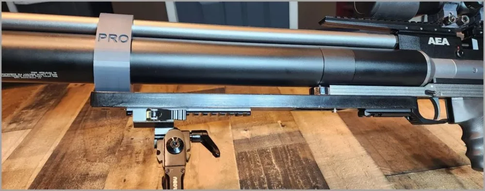Here's an alt tag for the image: AEA Pro air rifle mounted on tripod.