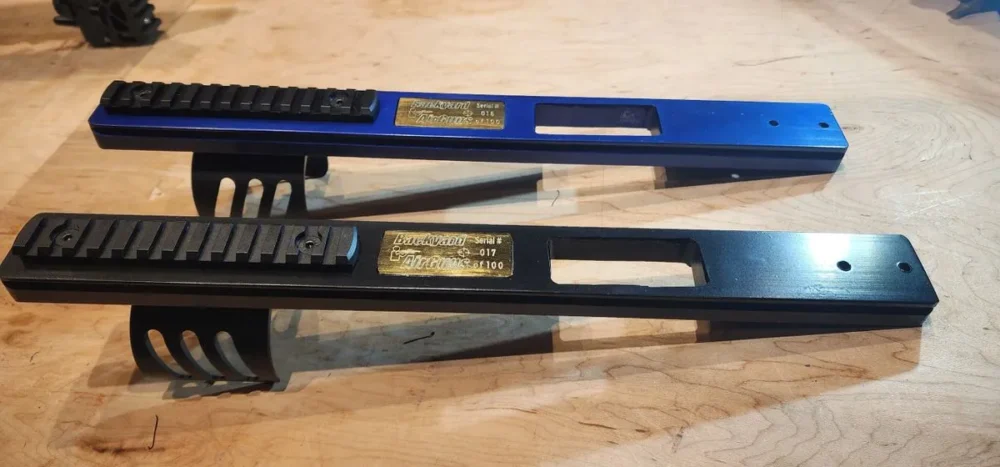 Here's an alt tag for the image: Two Backyard Airguns scope mounts.